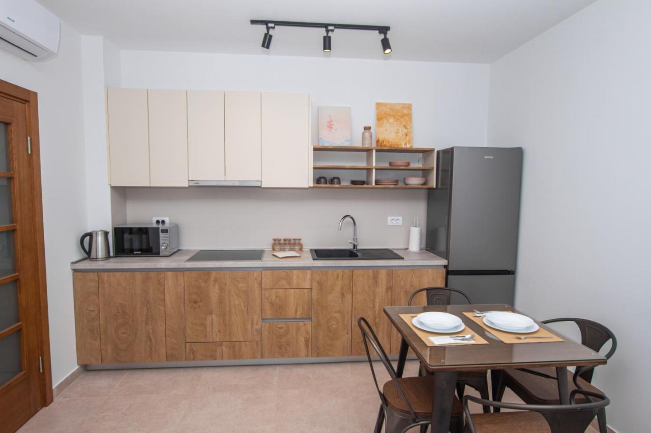 Zia Apartments بار المظهر الخارجي الصورة