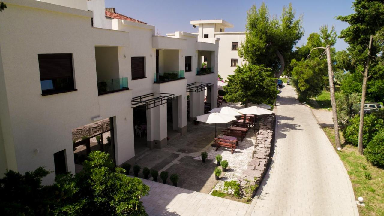 Zia Apartments بار المظهر الخارجي الصورة