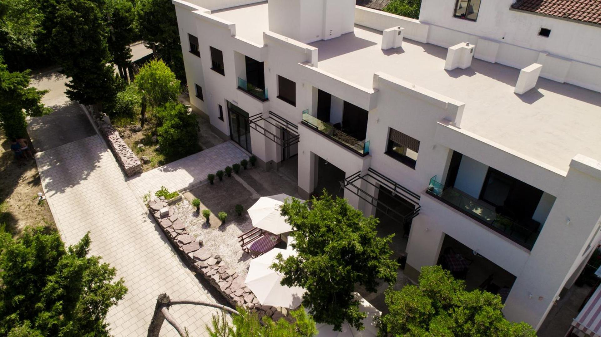 Zia Apartments بار المظهر الخارجي الصورة